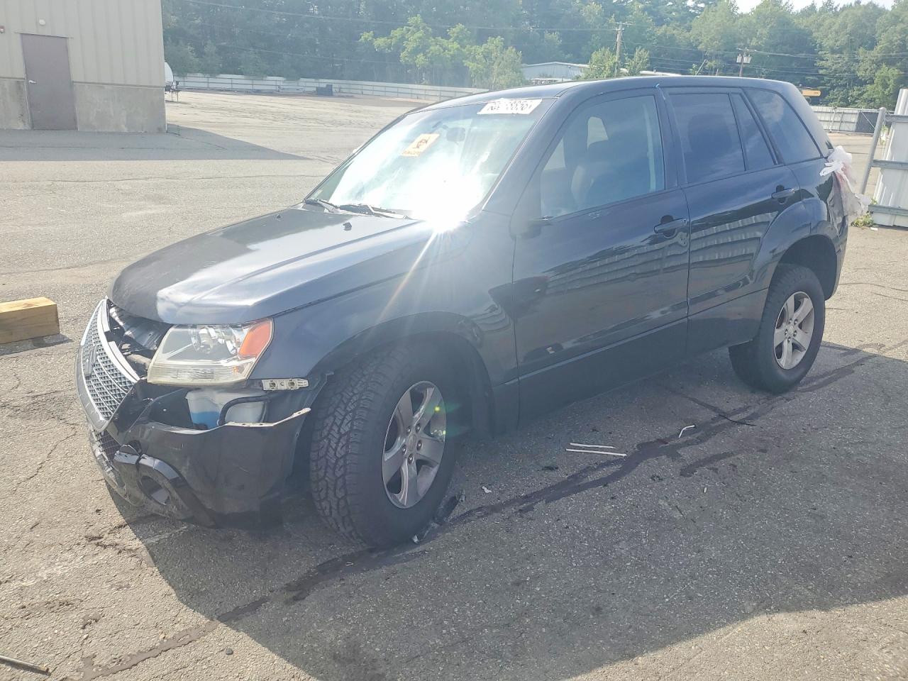 2011 Suzuki Grand Vitara Premium, VIN JS3TD0D20B4102845 — Бок