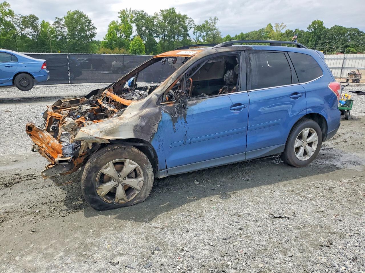 2015 Subaru Forester Limited, VIN JF2SJARC5FH587381 — Пожар в салоне