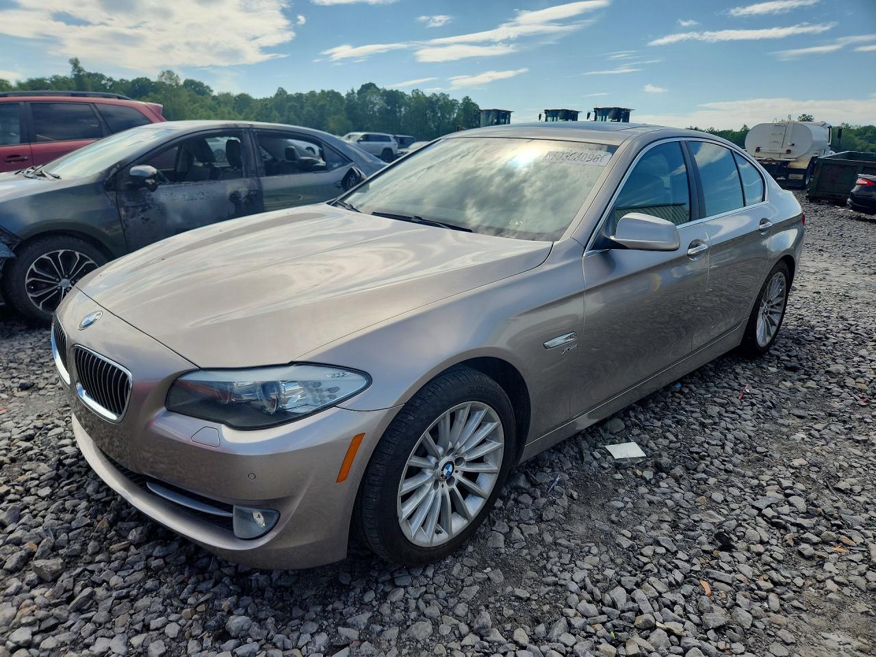 2011 BMW 5 Series 535i xDrive, VIN WBAFU7C51BC778501 — Side