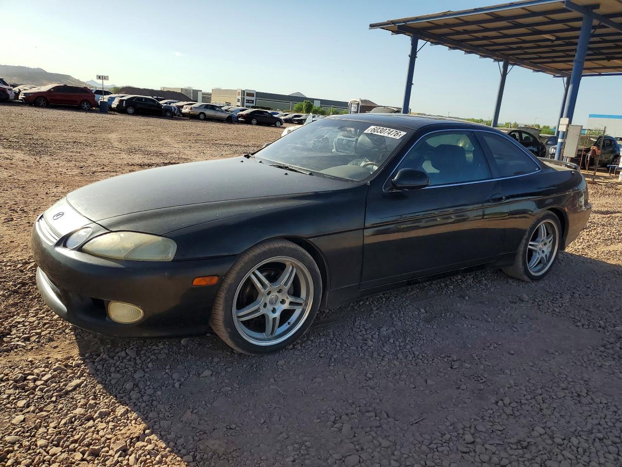 1997 Lexus SC 300, VIN JT8CD32Z2V0040455 — Minor dents and scratches