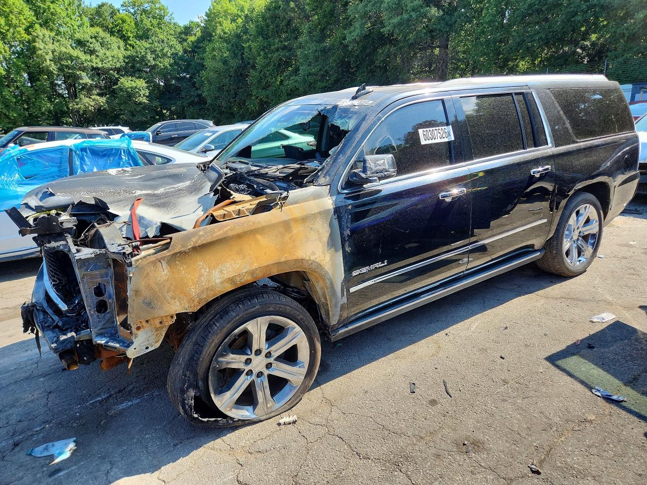 2016 GMC Yukon XL Denali, VIN 1GKS1HKJ7GR191355 — Burn