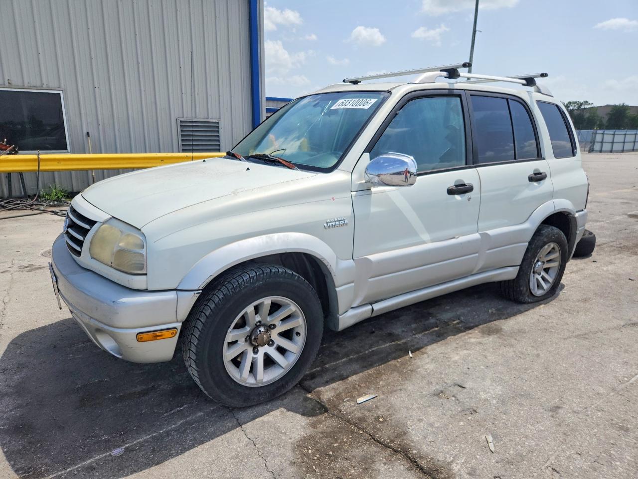 2004 Suzuki Grand Vitara LX, VIN JS3TE62V244101079 — Бок