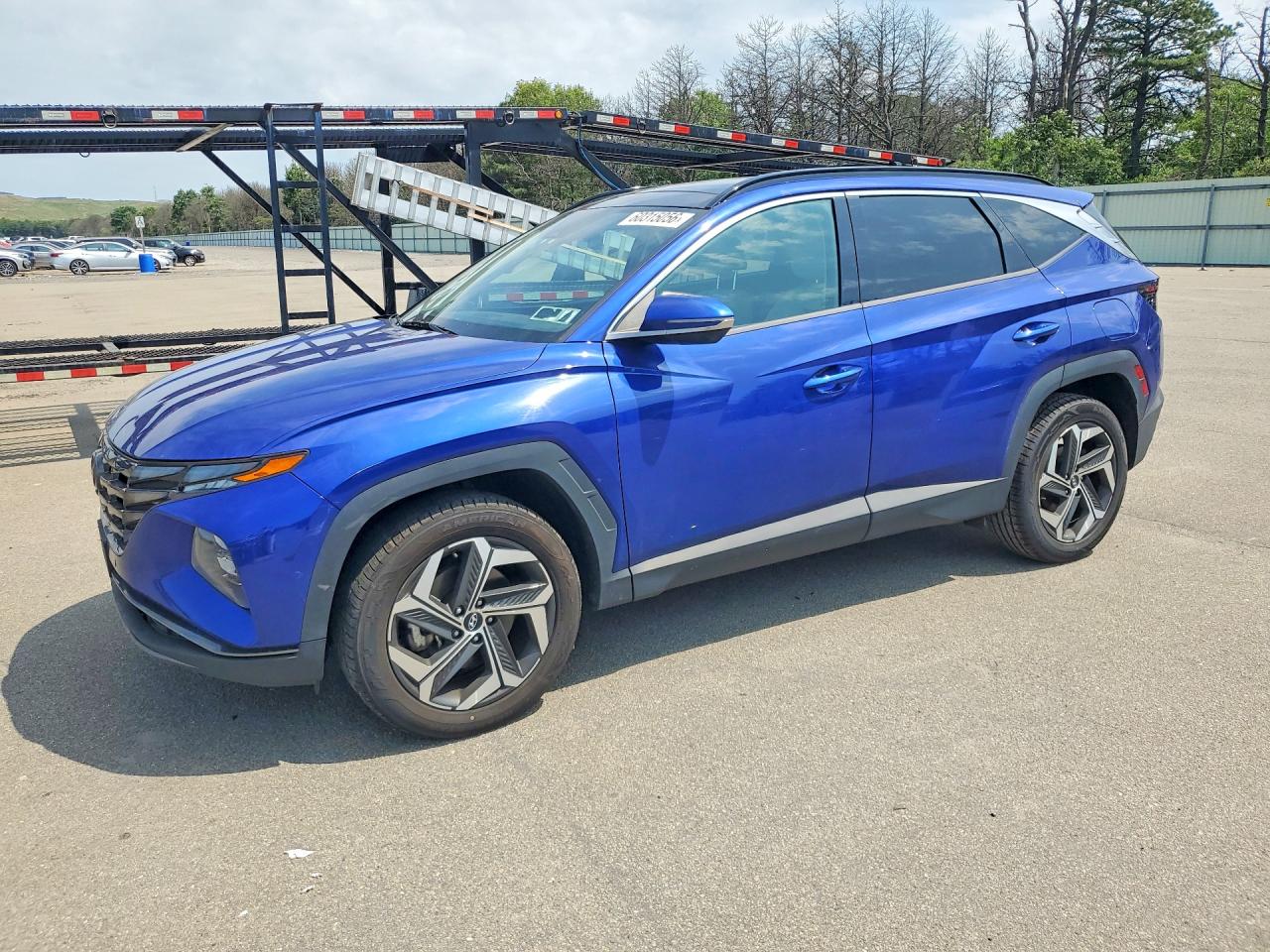 2022 Hyundai Tucson Limited, VIN 5NMJECAE1NH020587 — Side