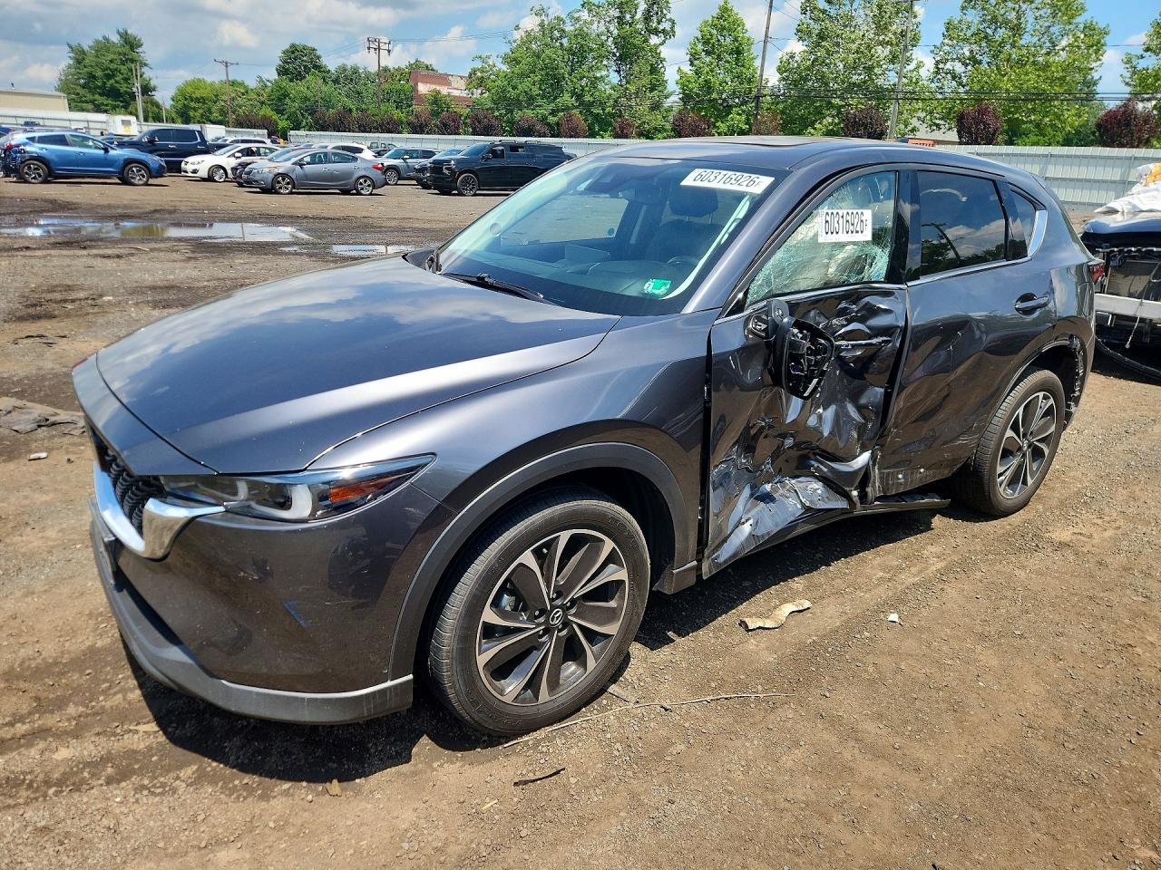 2022 Mazda CX-5 S Premium Plus, VIN JM3KFBEM1N1529996 — Бок