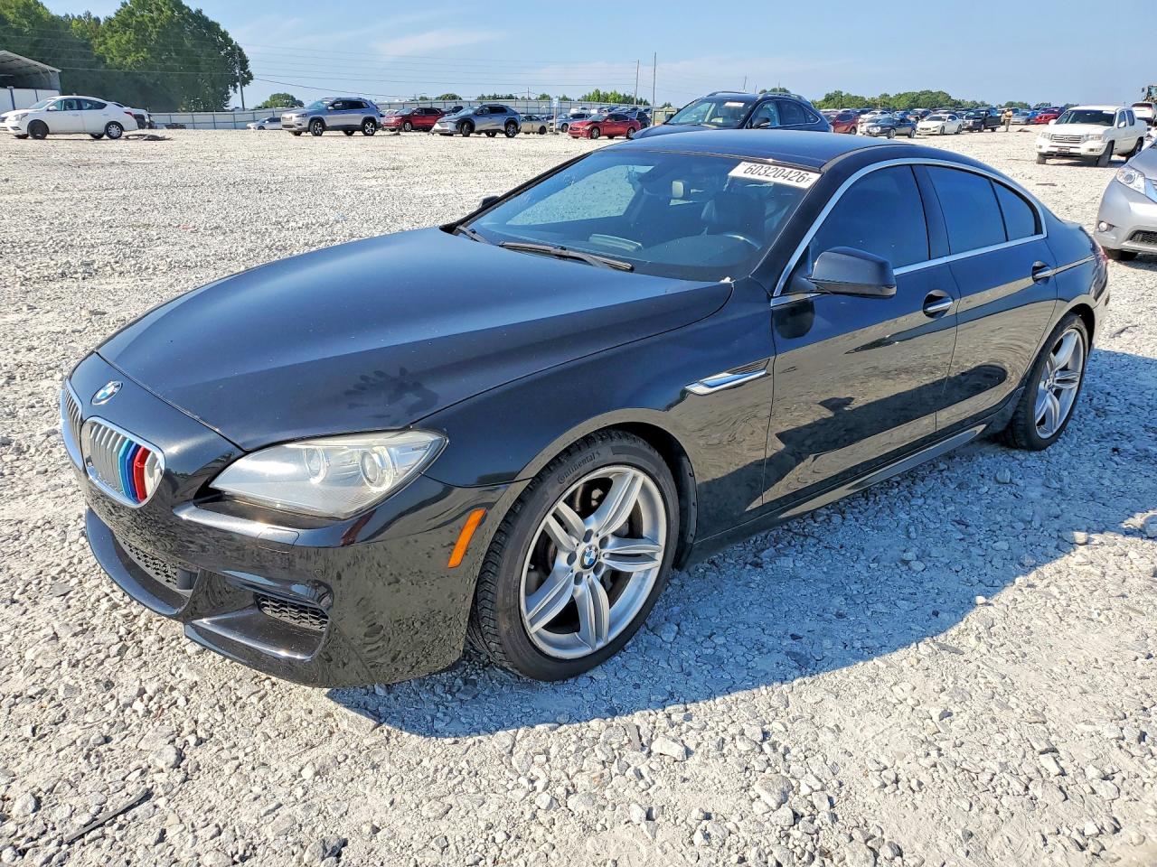 2013 BMW 6 Series 650i, VIN WBA6B2C50DDG66572 — Side