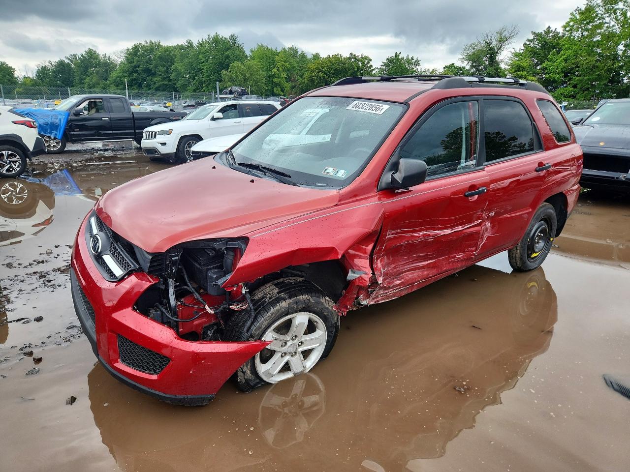 2010 Kia Sportage LX, VIN KNDKGCA30A7701063 — Side