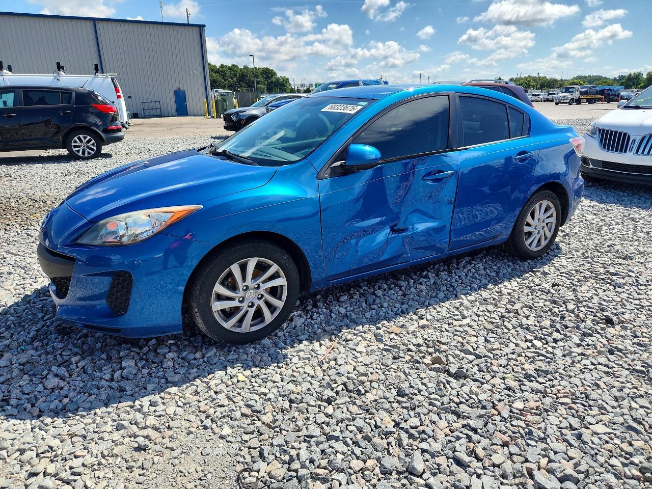 2012 Mazda 3 i Touring, VIN JM1BL1V75C1645544 — Бок