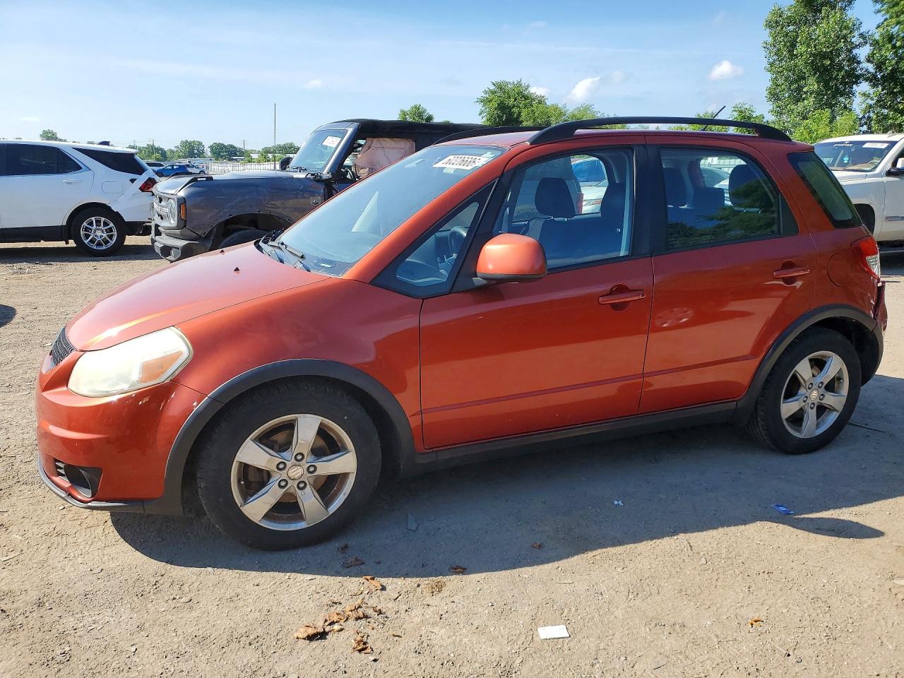2011 Suzuki SX4, VIN JS2YB5A23B6300891 — Rear end