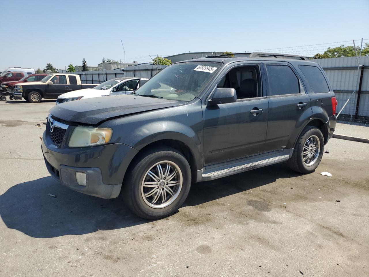 2008 Mazda Tribute Sport, VIN 4F2CZ02Z48KM15627 — Side