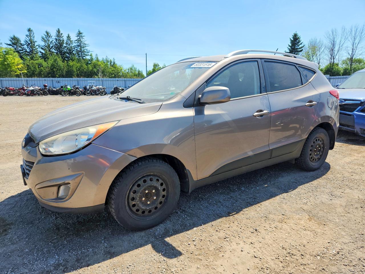 2012 Hyundai Tucson GLS, VIN KM8JUCAC6CU522126 — Front end