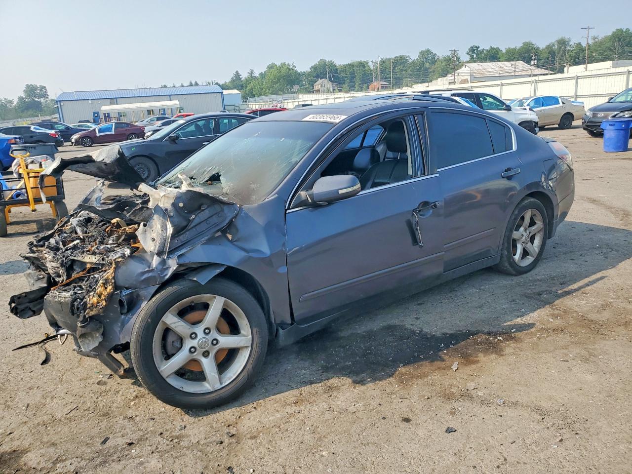 2010 Nissan Altima SL, VIN 1N4AL2AP7AN519589 — Engine fire