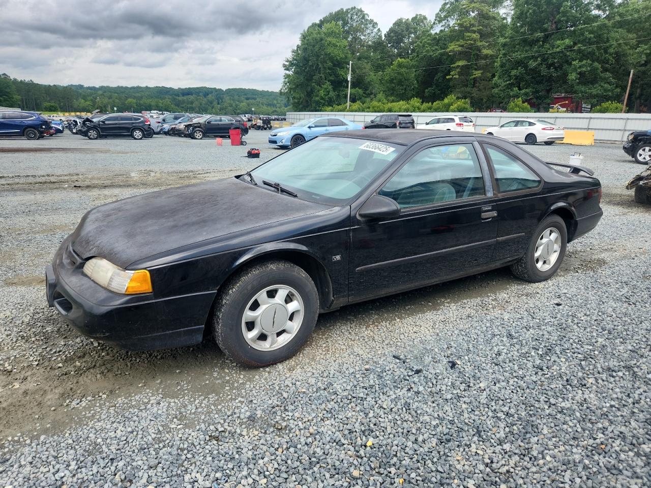 1995 Ford Thunderbird LX, VIN 1FALP62W4SH100349 — Normal wear