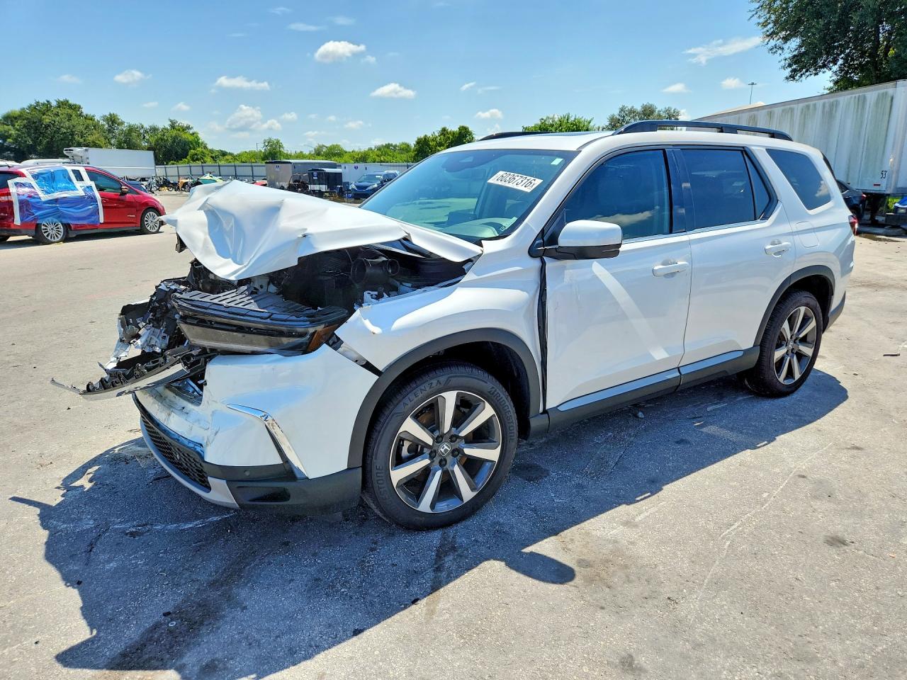 2025 Honda Pilot Touring, VIN 5FNYG1H78SB170603 — Перед