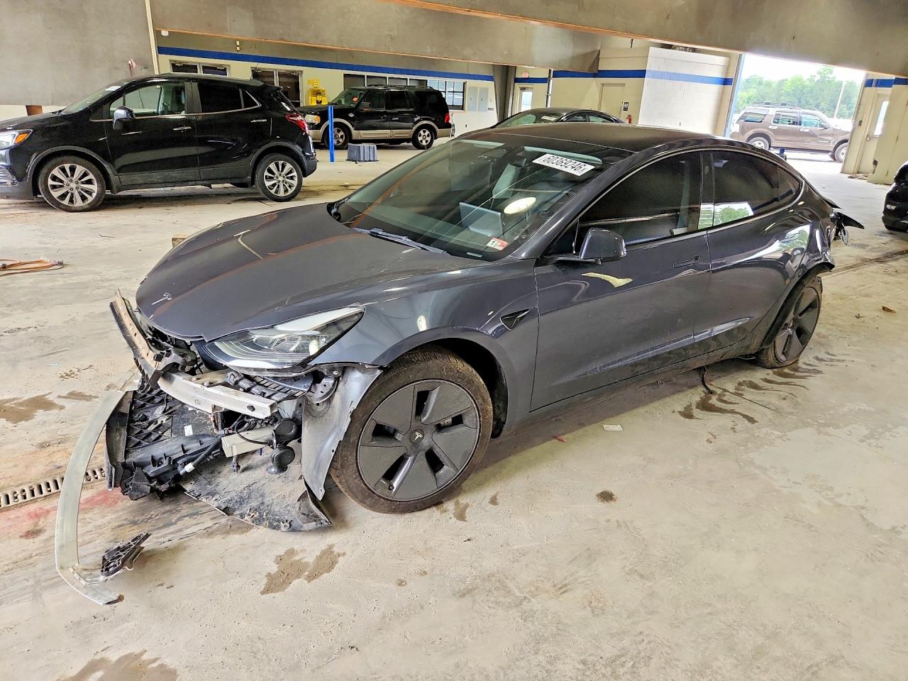 2023 Tesla Model 3, VIN 5YJ3E1EA4PF463292 — Rear end