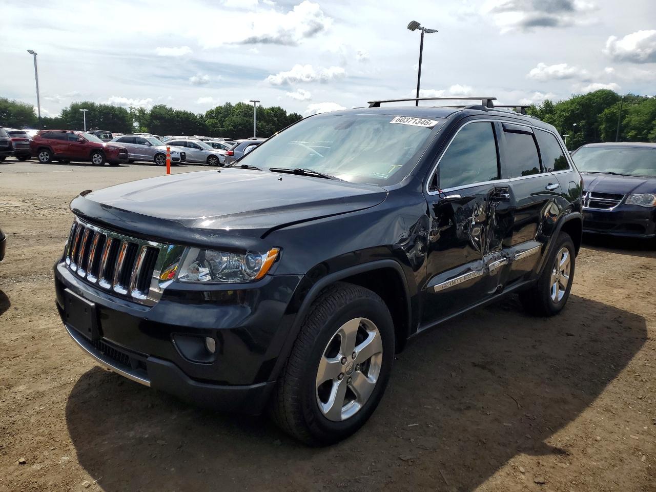 2013 Jeep Grand Cherokee Limited, VIN 1C4RJFBT5DC595575 — Side
