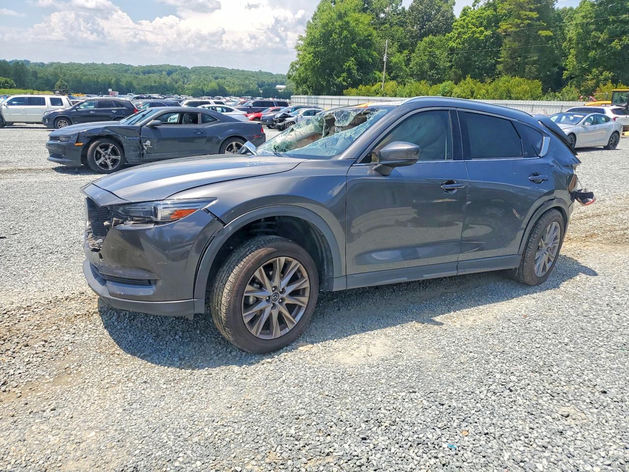 2021 Mazda CX-5 Grand Touring, VIN JM3KFBDM6M0436994 — Rear end