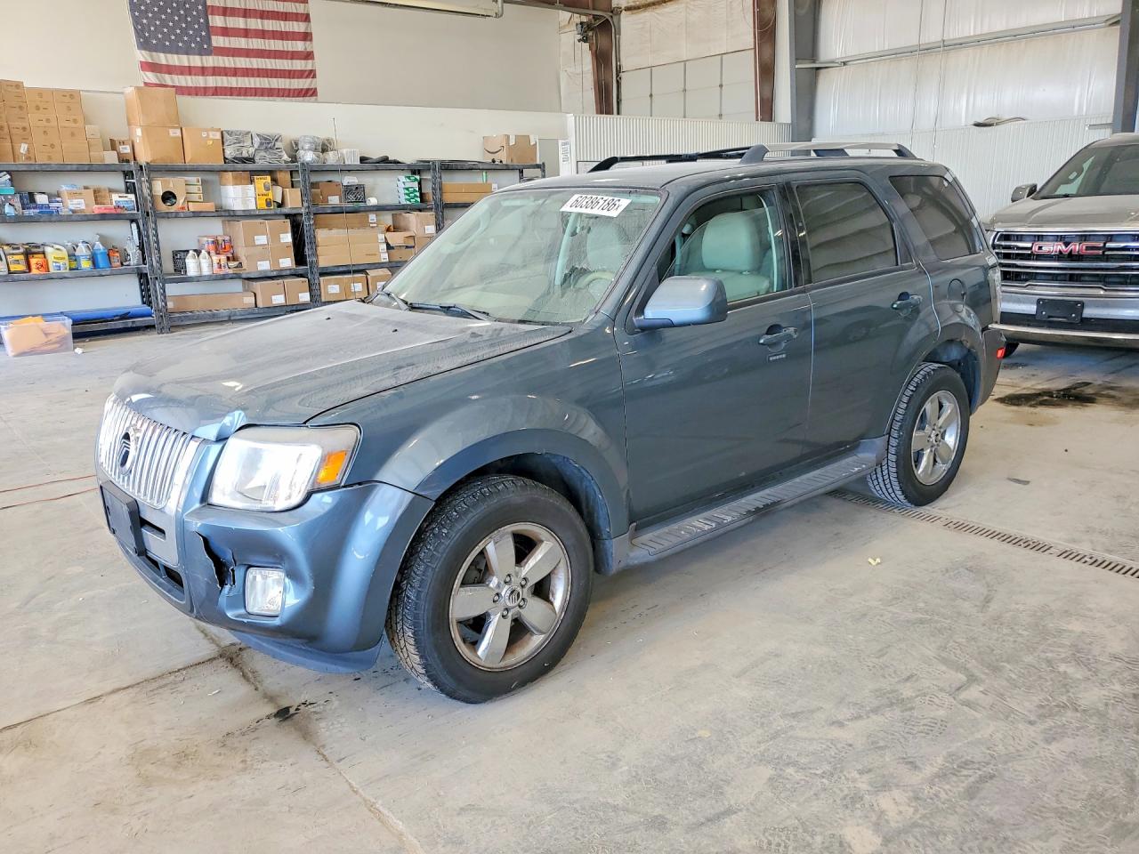 2011 Mercury Mariner Premier, VIN 4M2CN8HG1BKJ06344 — Rear end