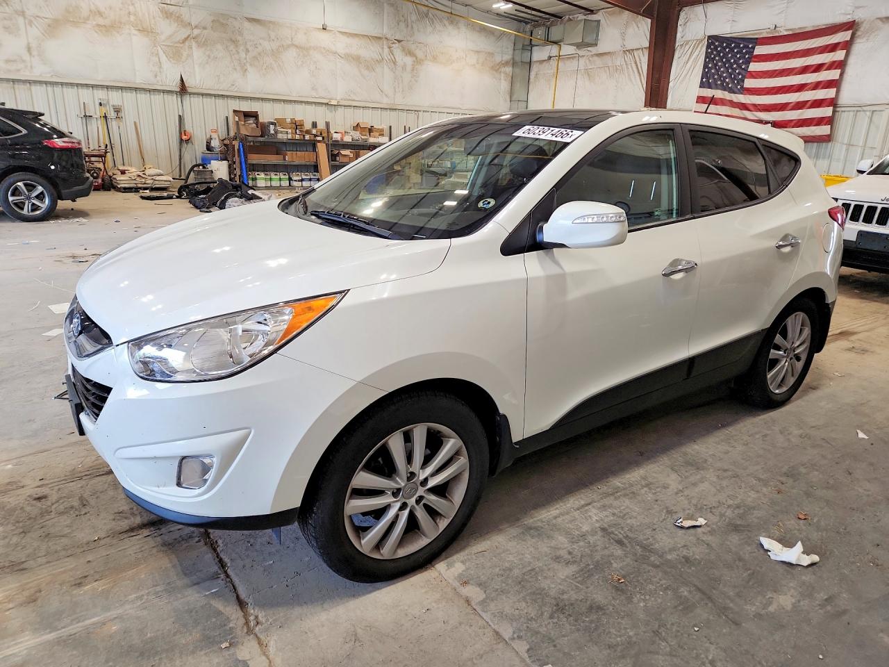 2012 Hyundai Tucson GLS, VIN KM8JUCAC7CU543924 — Rear end