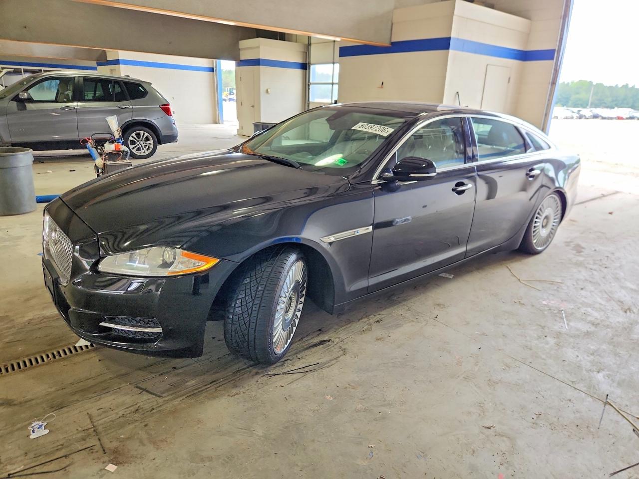 2015 Jaguar XJ Portfolio, VIN SAJWJ2GD9F8V88617 — Undercarriage