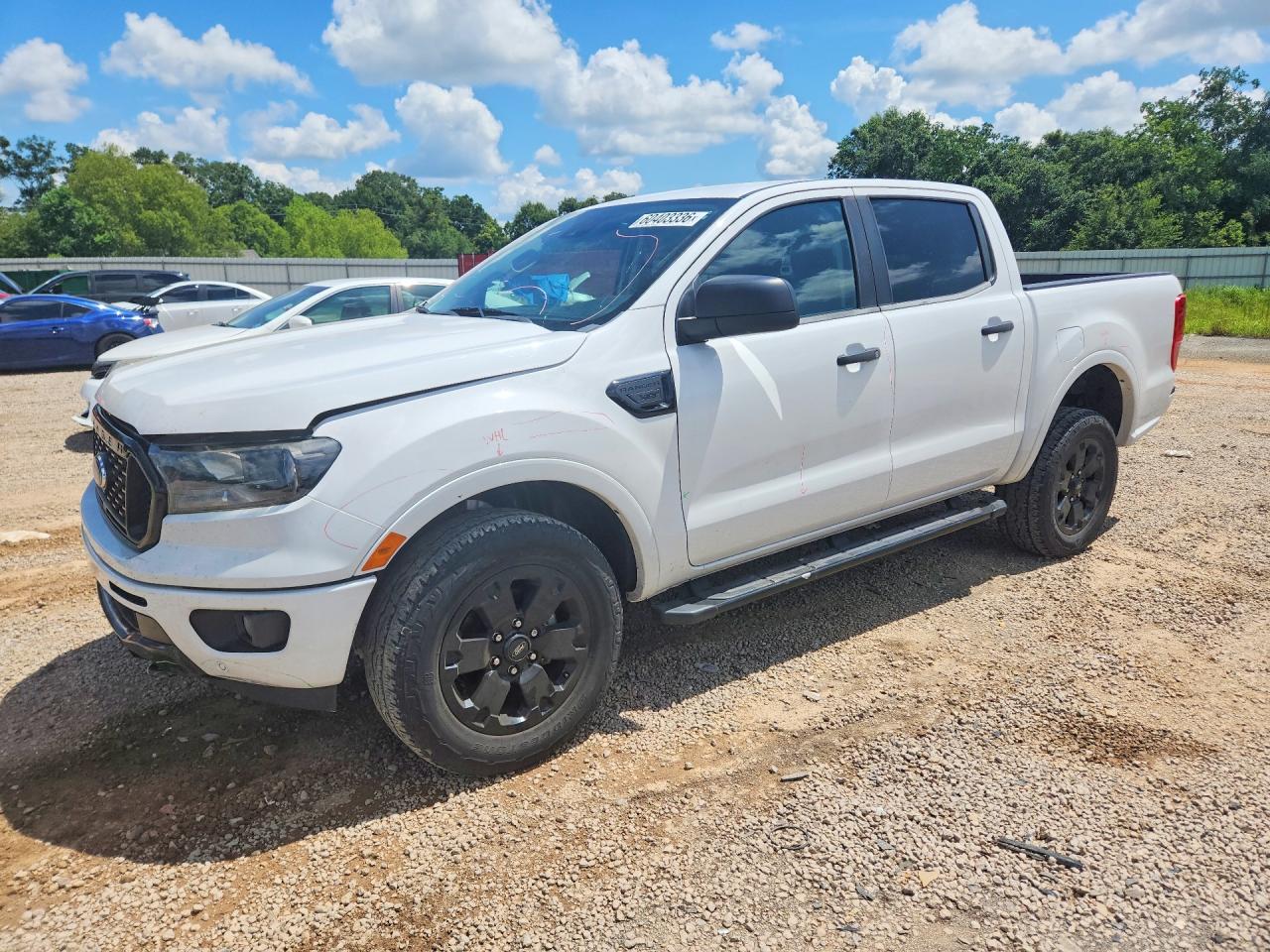 2019 Ford Ranger XLT, VIN 1FTER4EH5KLB19049 — Бок