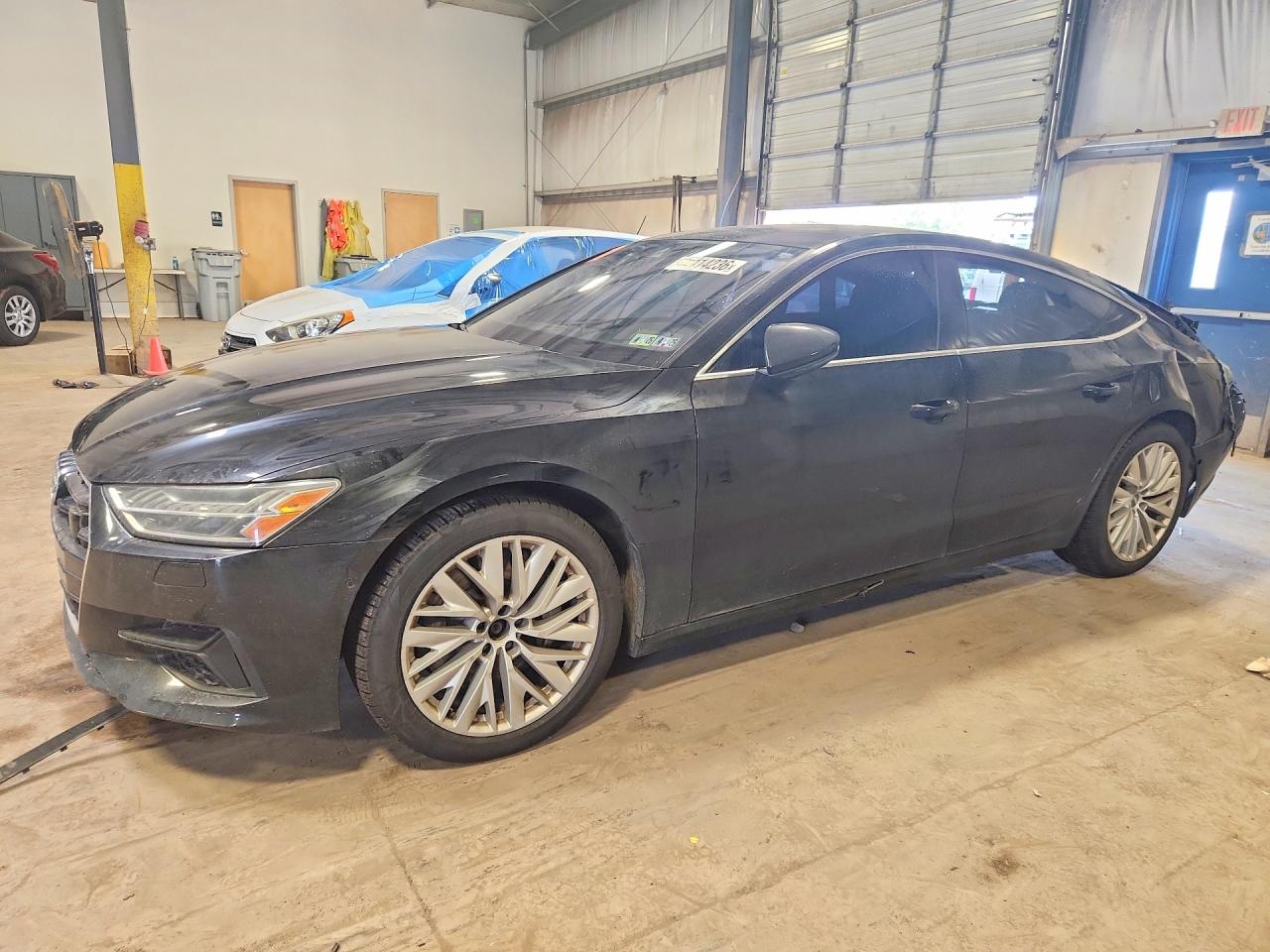 2019 Audi A7 Premium Plus, VIN WAUR2AF24KN031836 — Rear end