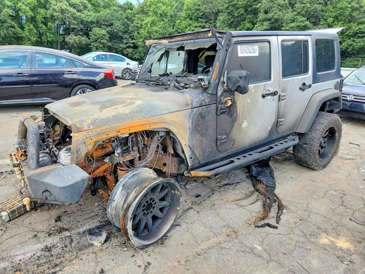 2008 Jeep Wrangler Unlimited Rubicon, VIN 1J8GA69178L601211 — Engine fire