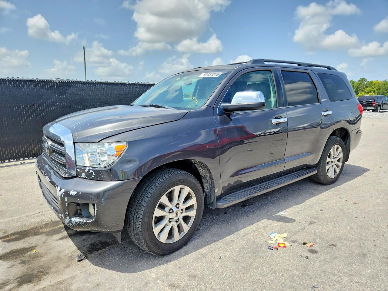 2011 Toyota Sequoia Limited, VIN 5TDJY5G10BS040474 — Prior damage history