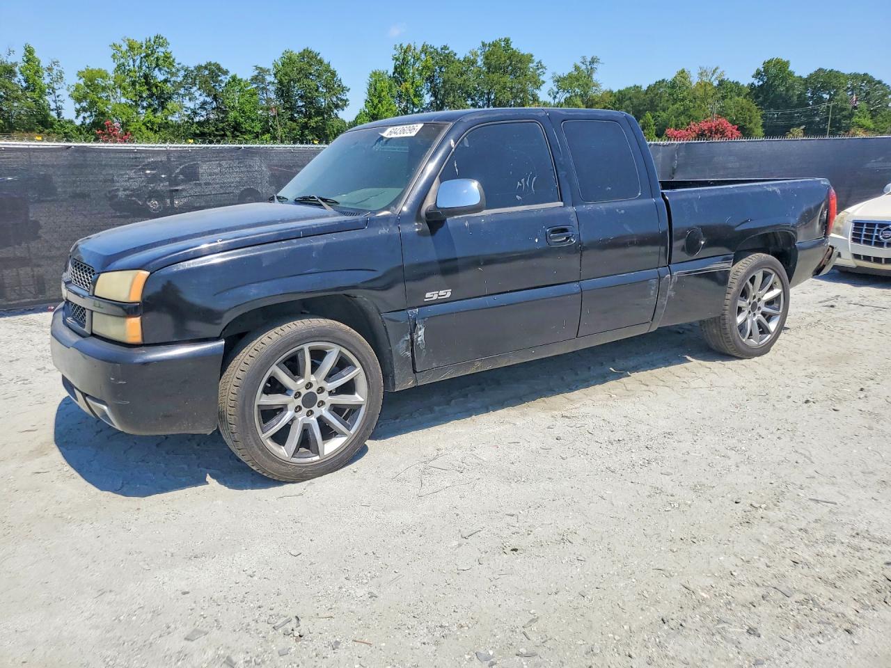 2003 Chevrolet Silverado SS, VIN 2GCEK19N831338517 — Side