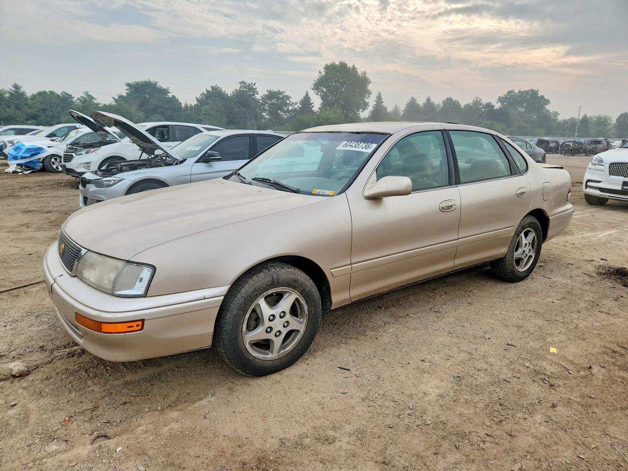 1997 Toyota Avalon XL, VIN 4T1BF12B2VU164311 — Зад