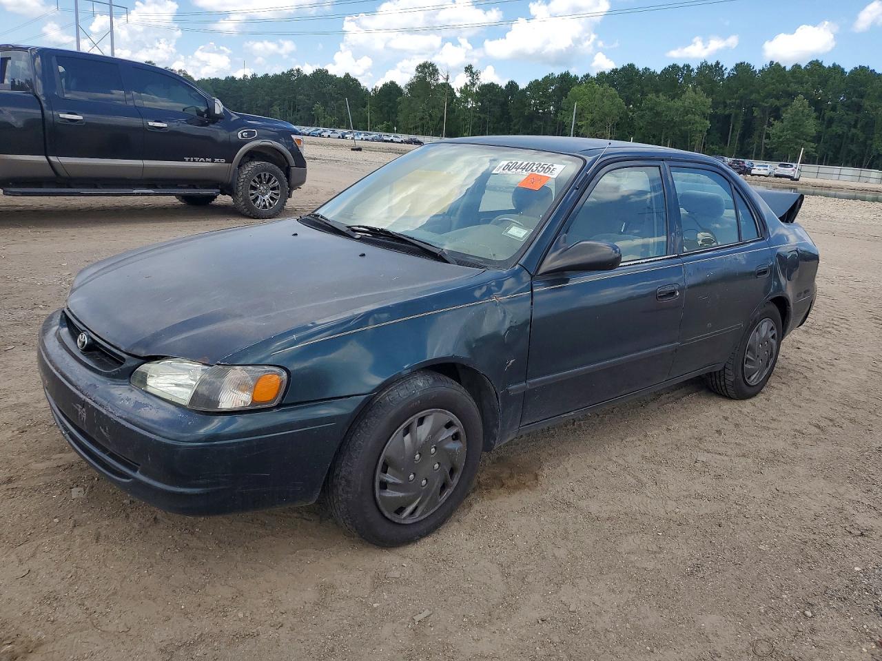 1999 Toyota Corolla CE, VIN 1NXBR12E9XZ159823 — Rear end