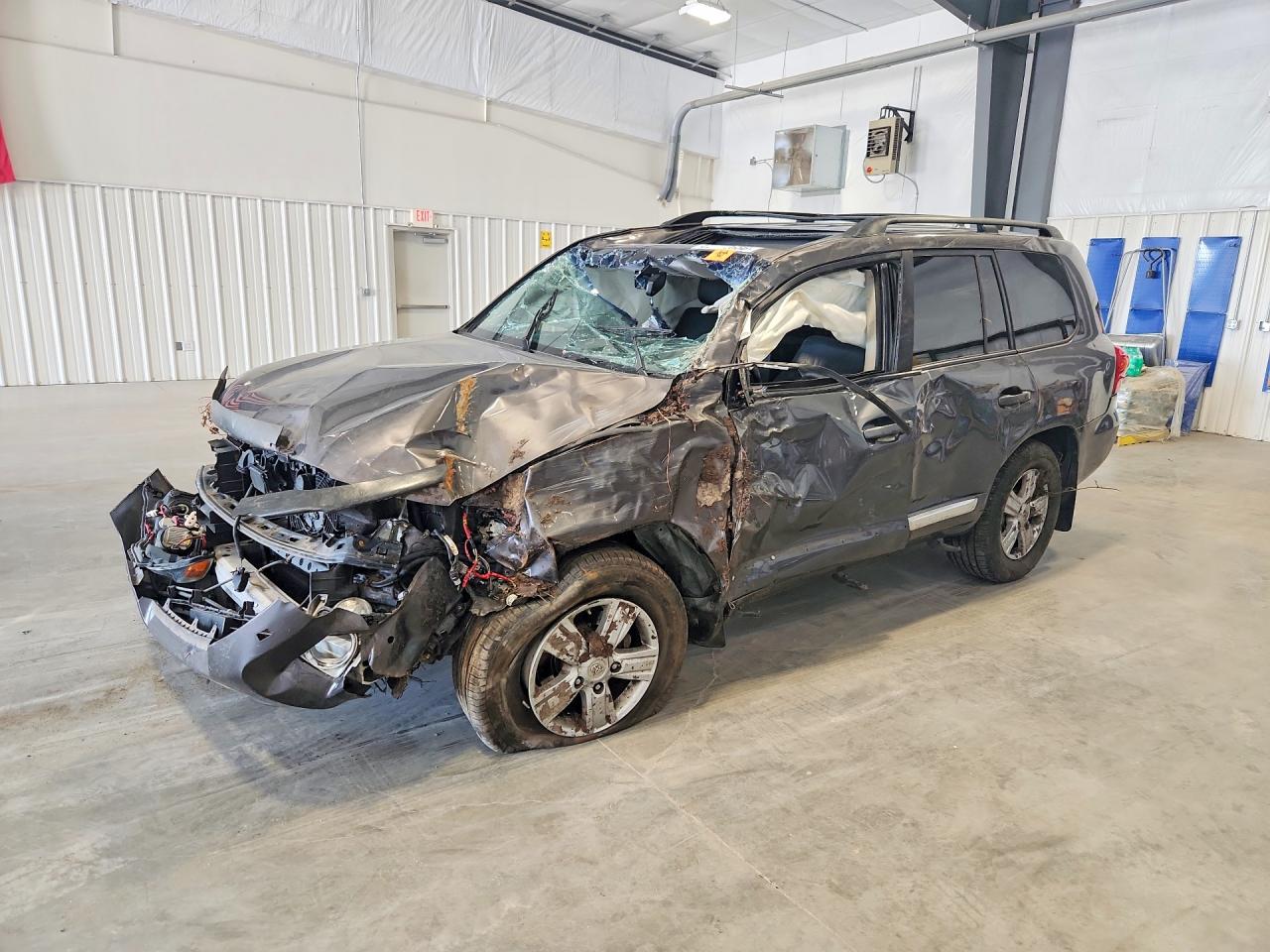 2013 Toyota Land Cruiser, VIN JTMHY7AJ5D4012090 — Rollover