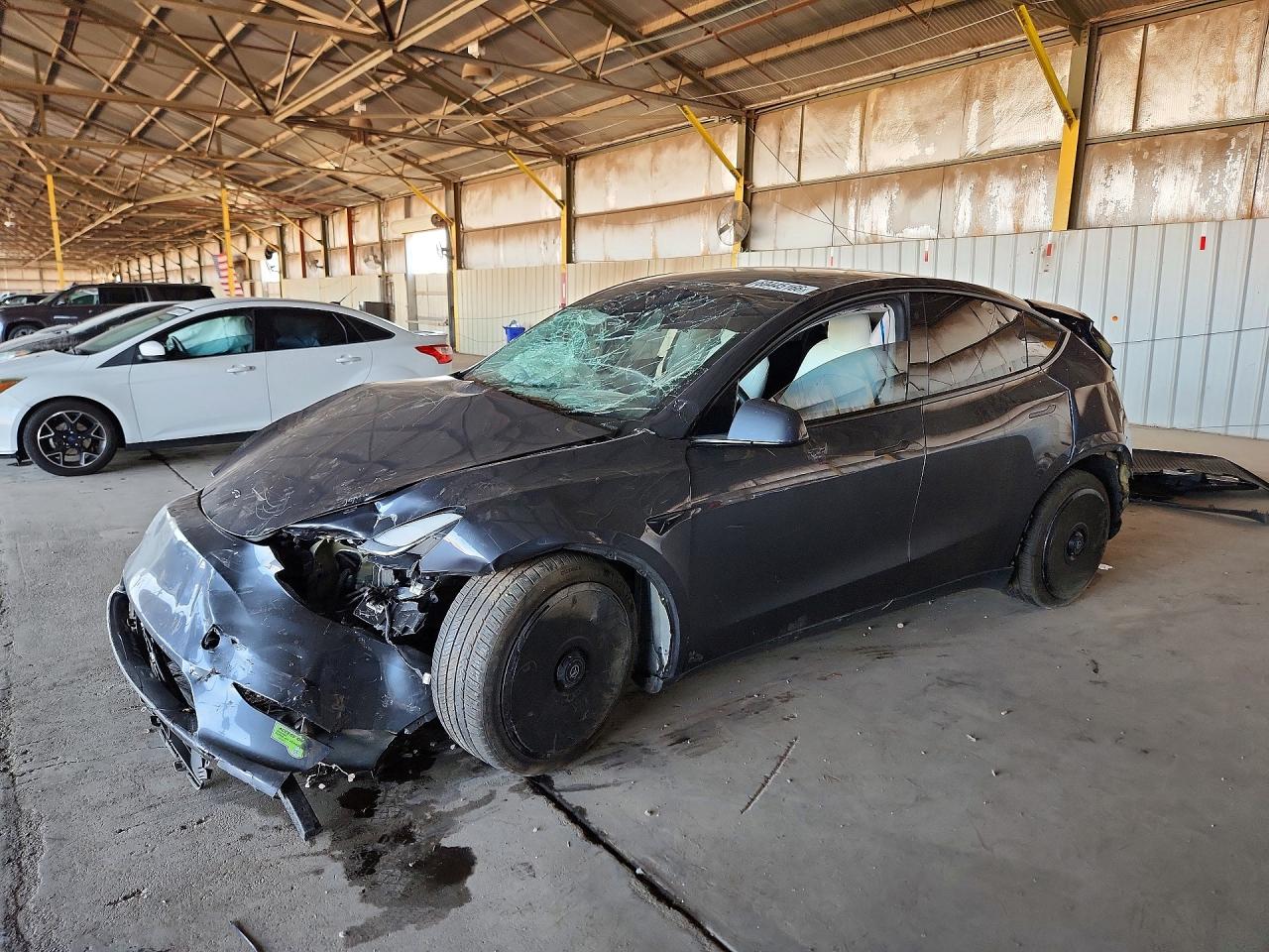 2023 Tesla Model Y Long Range, VIN 7SAYGDEE9PF709423 — All over