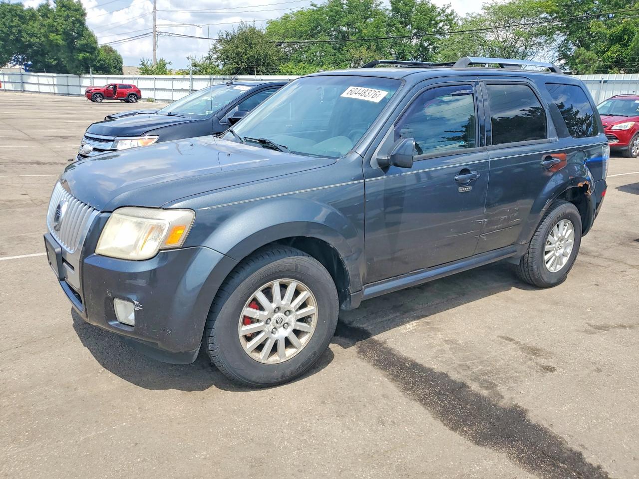 2010 Mercury Mariner Premier, VIN 4M2CN8H76AKJ12932 — Side