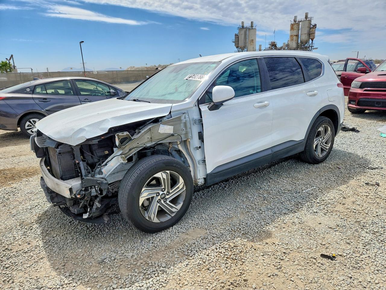 2021 Hyundai Santa Fe SE, VIN 5NMS14AJ2MH319622 — Front end
