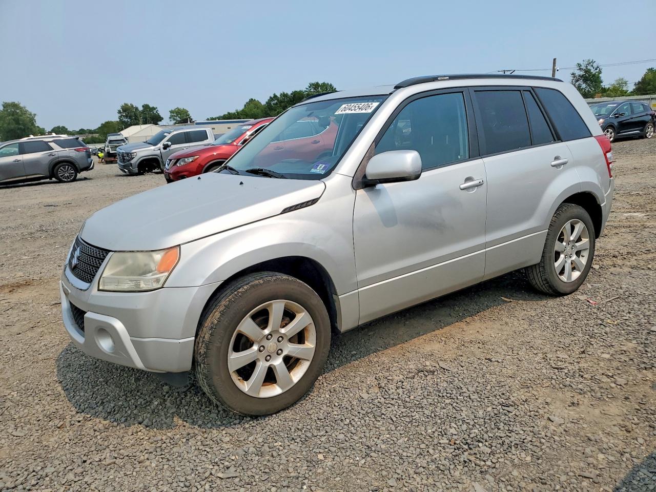 2012 Suzuki Grand Vitara Limited, VIN JS3TD0D74C4100819 — Minor dents and scratches