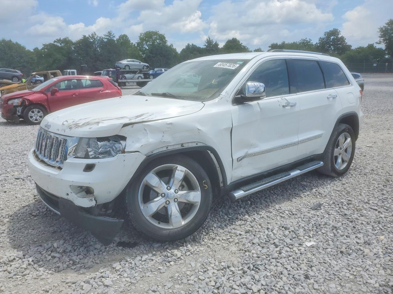 2013 Jeep Grand Cherokee Overland Summit, VIN 1C4RJECT0DC596853 — Front end
