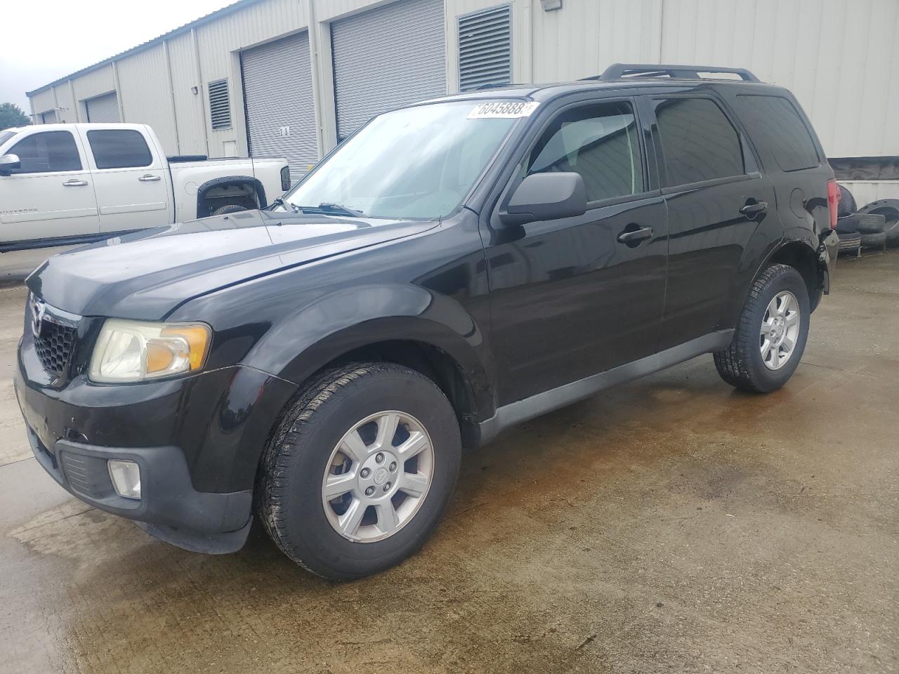 2011 Mazda Tribute Touring, VIN 4F2CY9C7XBKM02716 — Rear end
