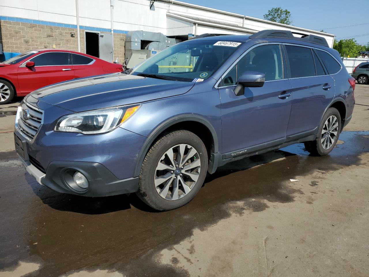 2016 Subaru Outback Limited, VIN 4S4BSANC7G3291788 — Side