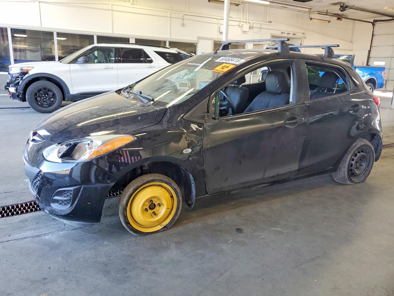 2012 Mazda 2 Sport, VIN JM1DE1KY2C0133441 — Rear end