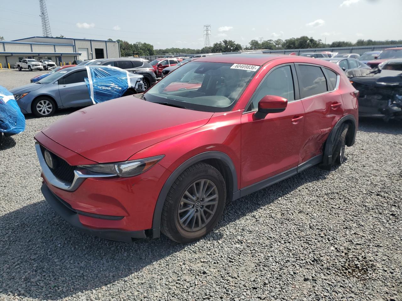 2021 Mazda CX-5 Touring, VIN JM3KFBCM7M1464766 — Бок