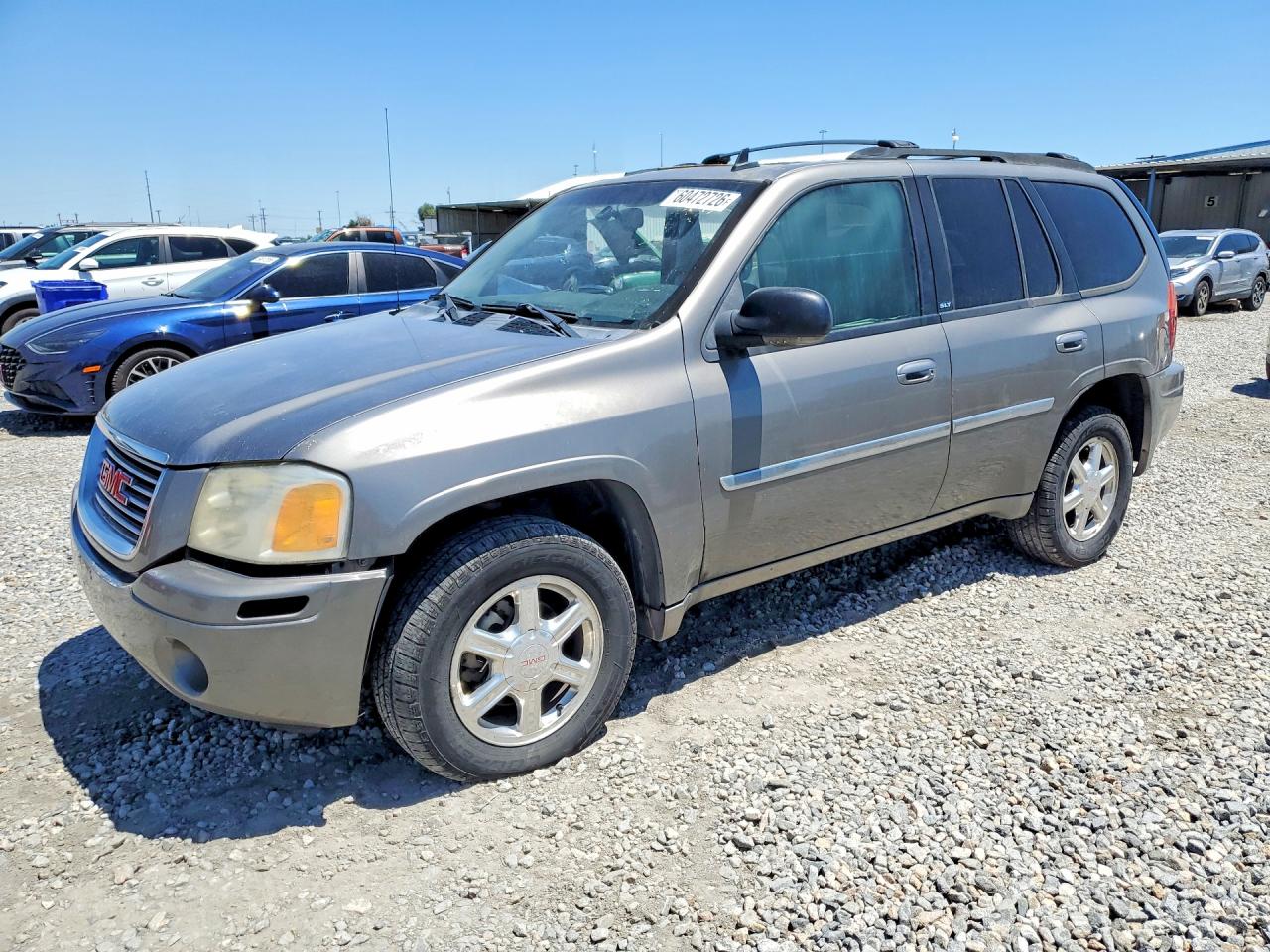 2007 GMC Envoy SLE, VIN 1GKDT13SX72108706 — Бок