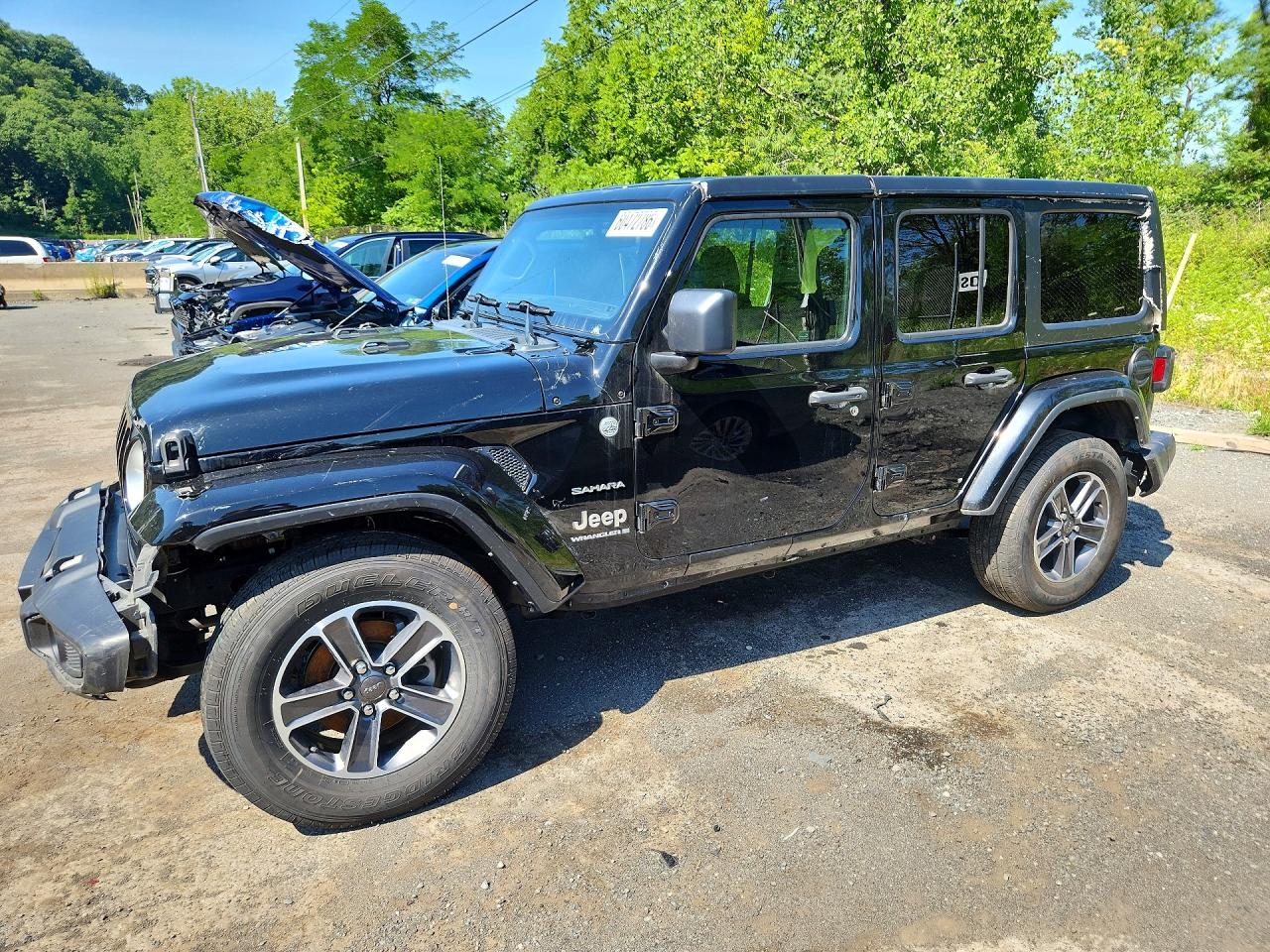 2023 Jeep Wrangler Sahara, VIN 1C4HJXEN0PW695083 — Front end