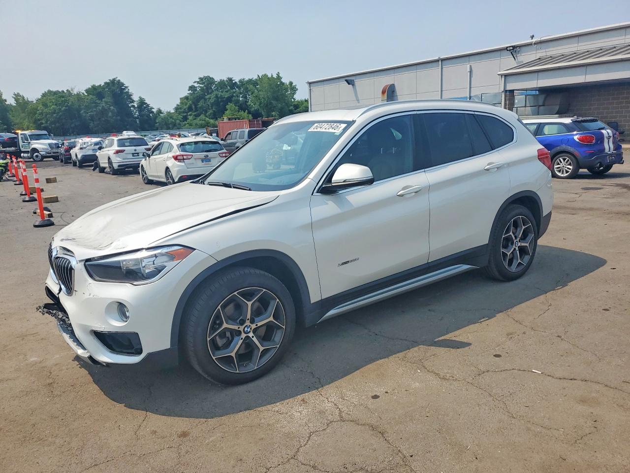 2018 BMW X1 xDrive28i, VIN WBXHT3C37J5L26659 — Front end