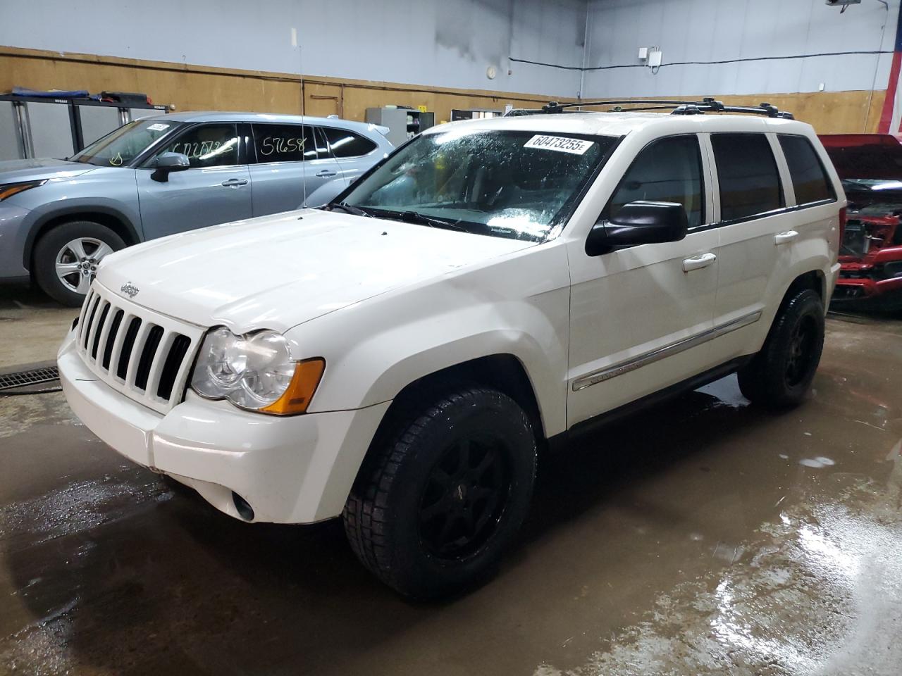 2010 Jeep Grand Cherokee Laredo, VIN 1J4PR4GK8AC148684 — Front end