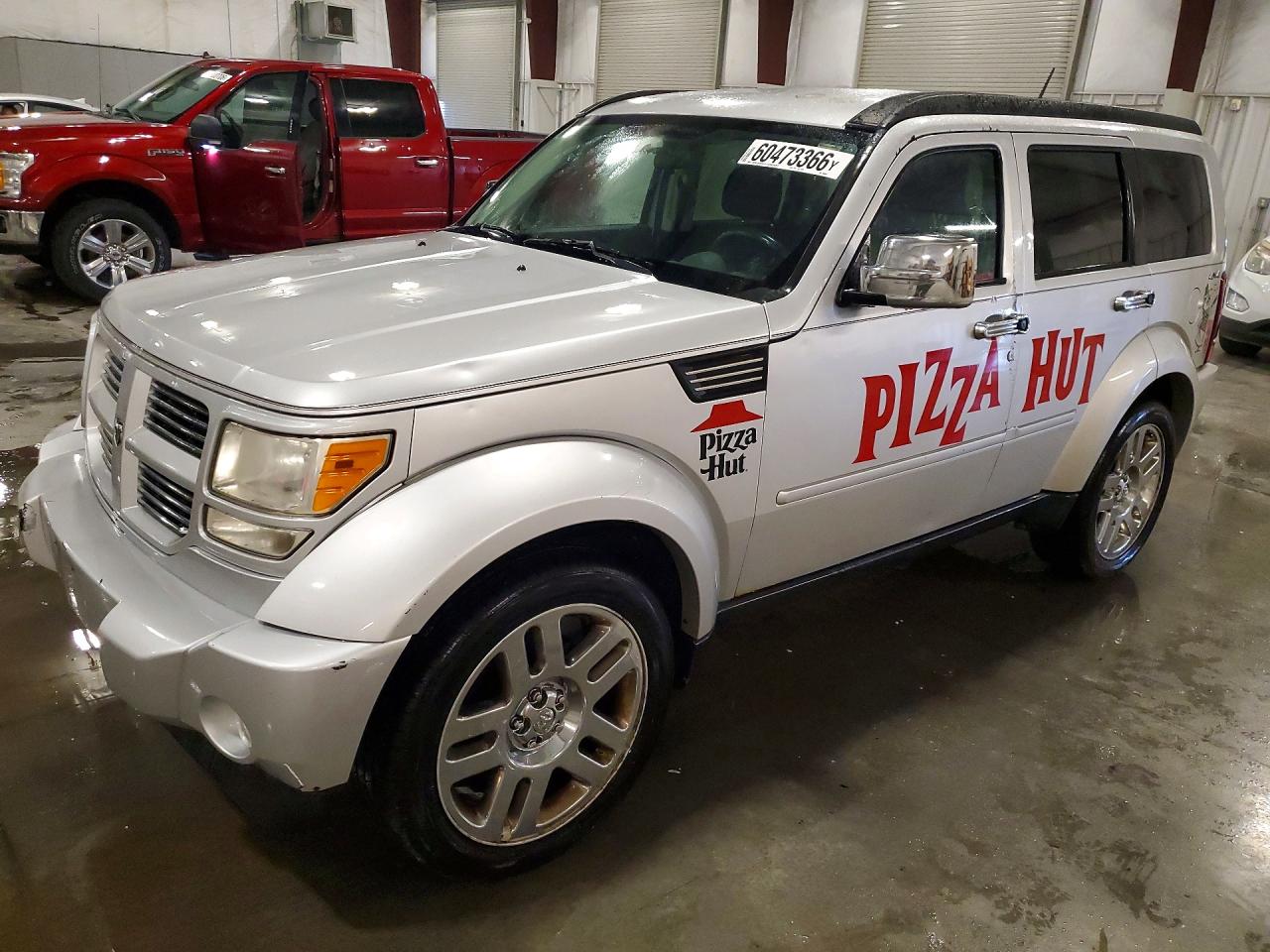 2011 Dodge Nitro Heat, VIN 1D4PU4GK4BW590868 — Hail