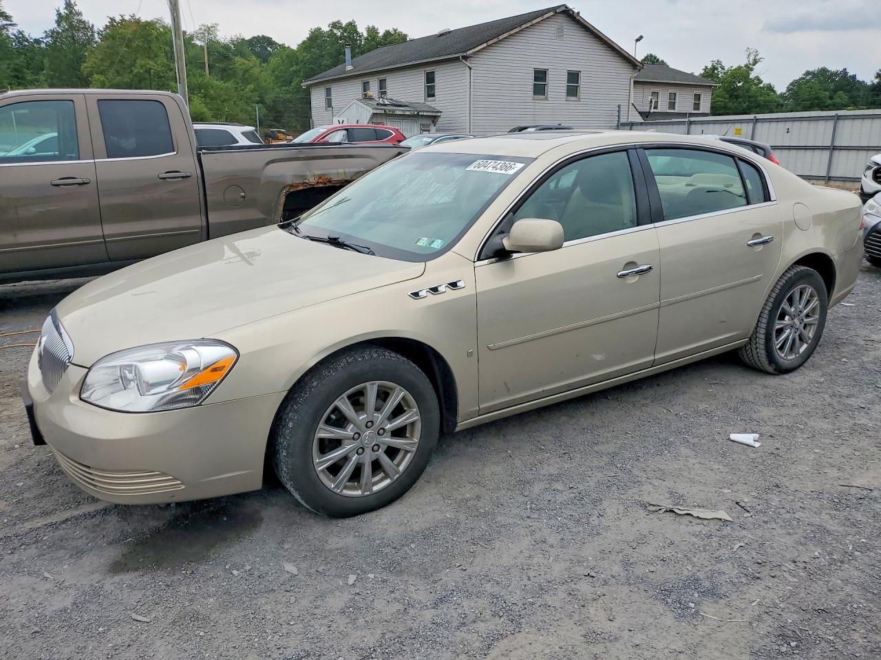 2009 Buick Lucerne CXL-4, VIN 1G4HD57M79U142666 — Side