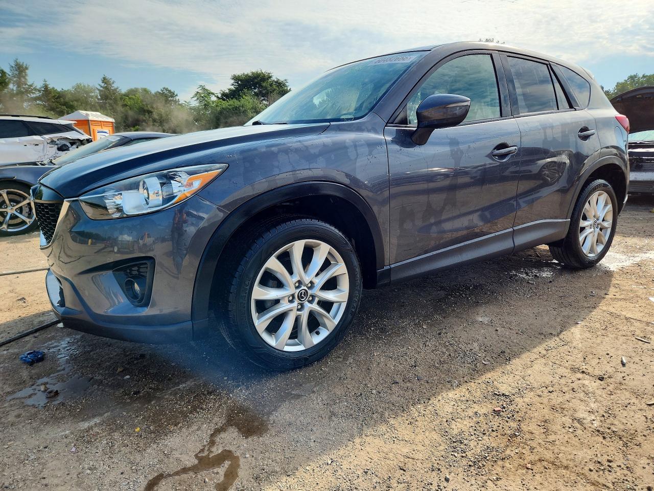 2015 Mazda CX-5 Grand Touring, VIN JM3KE4DY3F0486675 — Бок