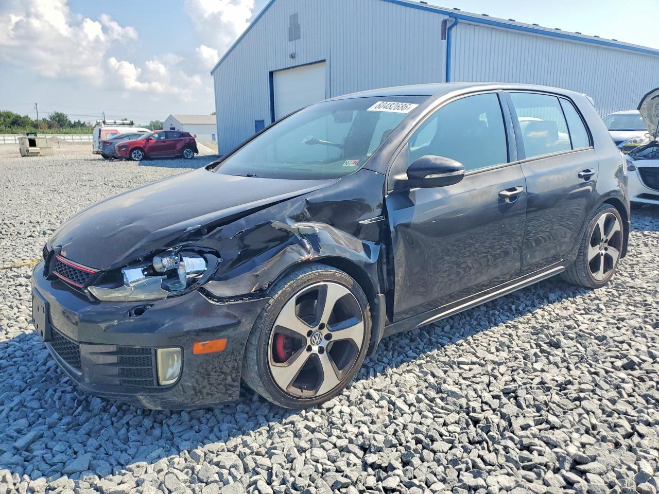 2014 Volkswagen Golf GTI Wolfsburg Edition, VIN WVWHD7AJ8EW010710 — Front end