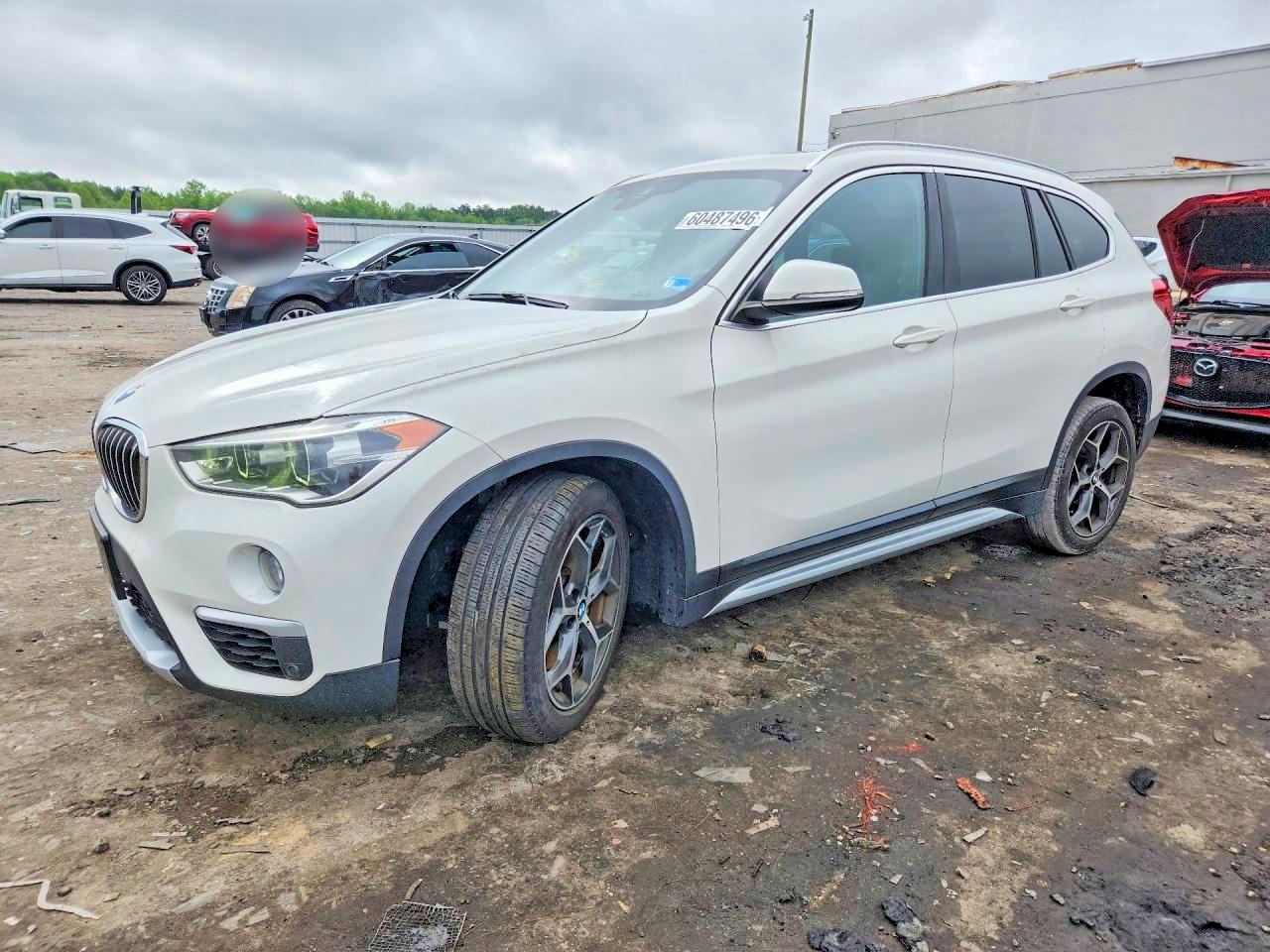2019 BMW X1 xDrive28i, VIN WBXHT3C54K5L97904 — Undercarriage