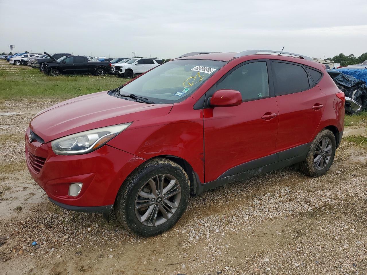 2014 Hyundai Tucson Limited, VIN KM8JUCAG3EU802821 — Side